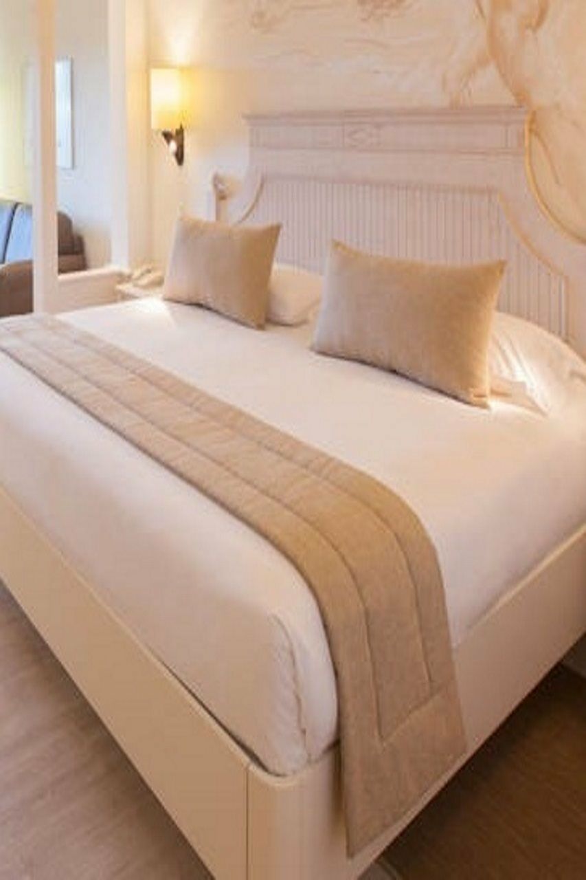 Lopesan Villa Del Conde Resort & Thalasso เมโลเนรัส ภายนอก รูปภาพ A bed runner
